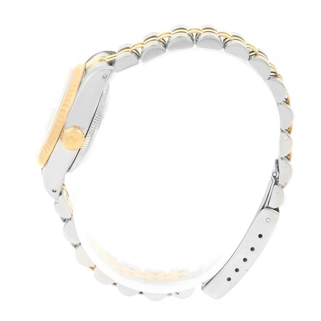 This image shows the side view of a Rolex Datejust 69173 Women
s Stainless Steel Champagne Dial 69173 Women
s Stainless Steel Champagne Dial watch, focusing on the bracelet and crown.