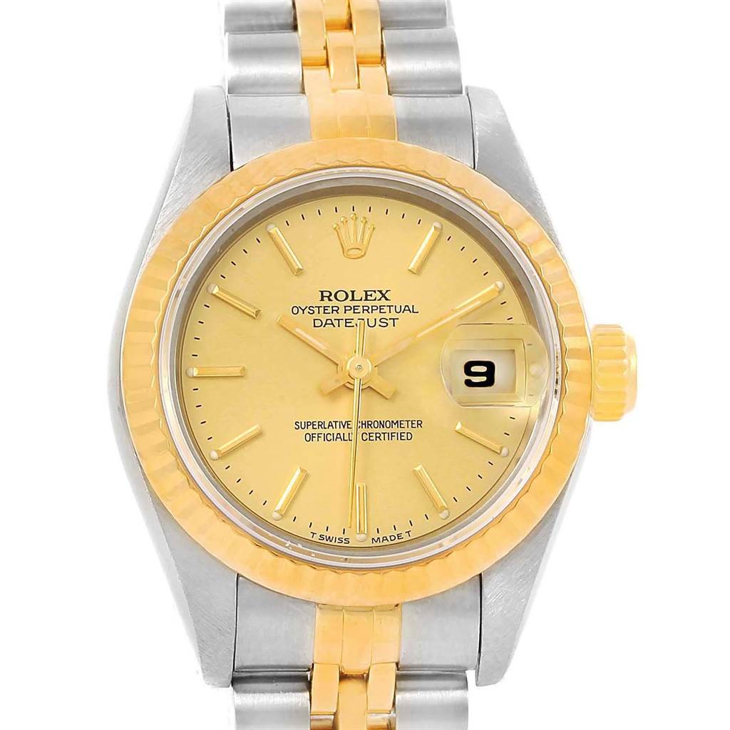 The Rolex Datejust 69173 Women
s Stainless Steel Champagne Dial 69173 Women
s Stainless Steel Champagne Dial watch is shown from the front, displaying its gold dial, bezel, and part of the two-tone bracelet.