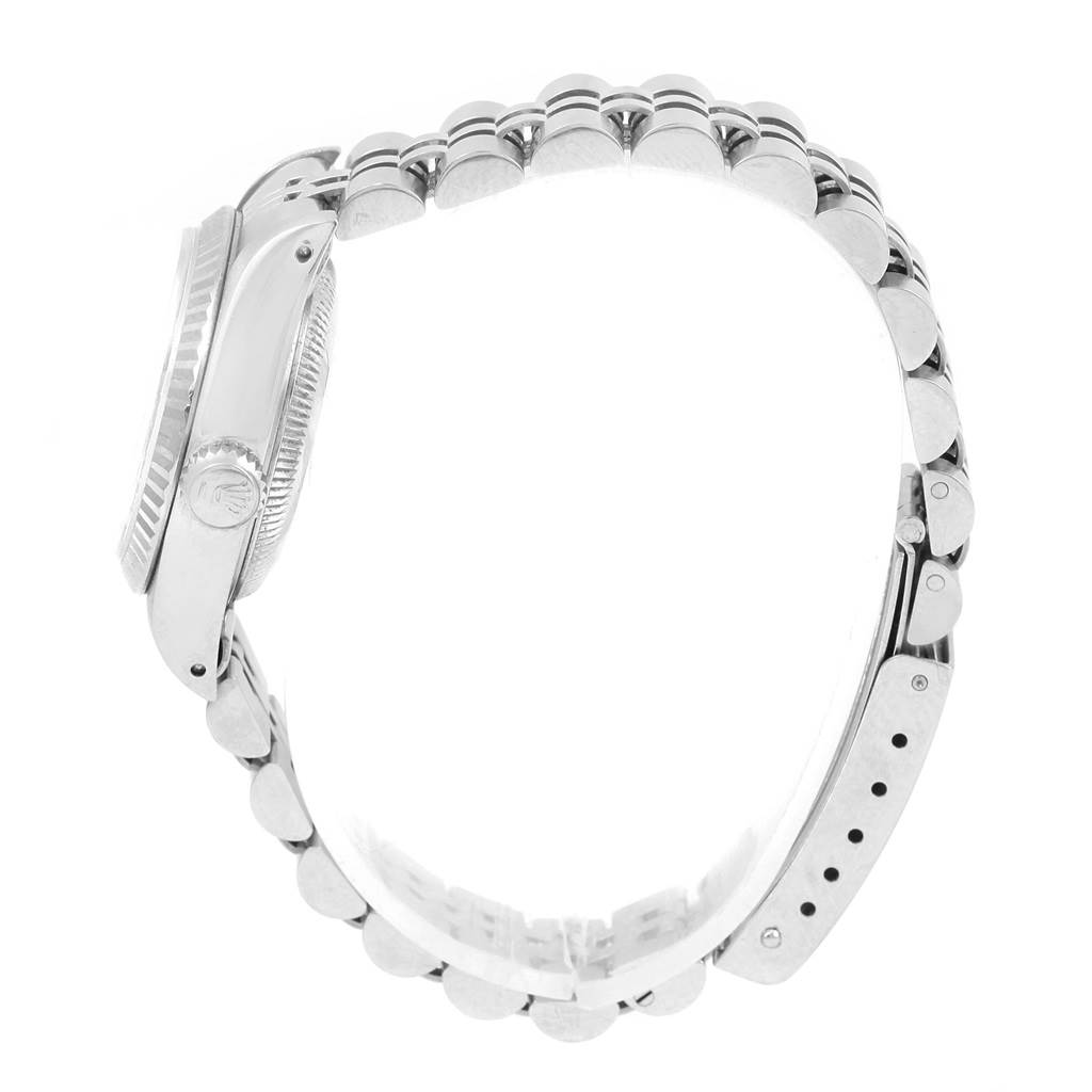 The image shows a side profile view of a Rolex Datejust 69174 Women's Stainless Steel Silver Dial 69174 Women's Stainless Steel Silver Dial, highlighting the watch case, crown, and bracelet.