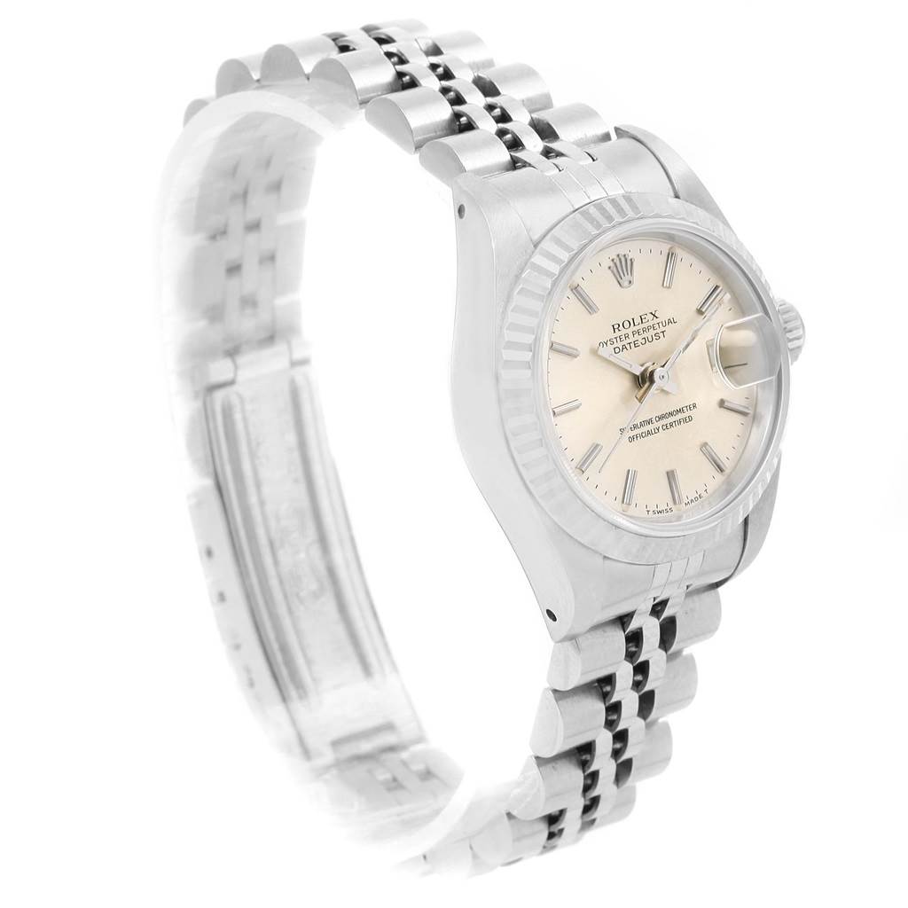 The image shows a left side view of a Rolex Datejust 69174 Women's Stainless Steel Silver Dial 69174 Women's Stainless Steel Silver Dial watch displaying its dial, crown, and part of the bracelet.
