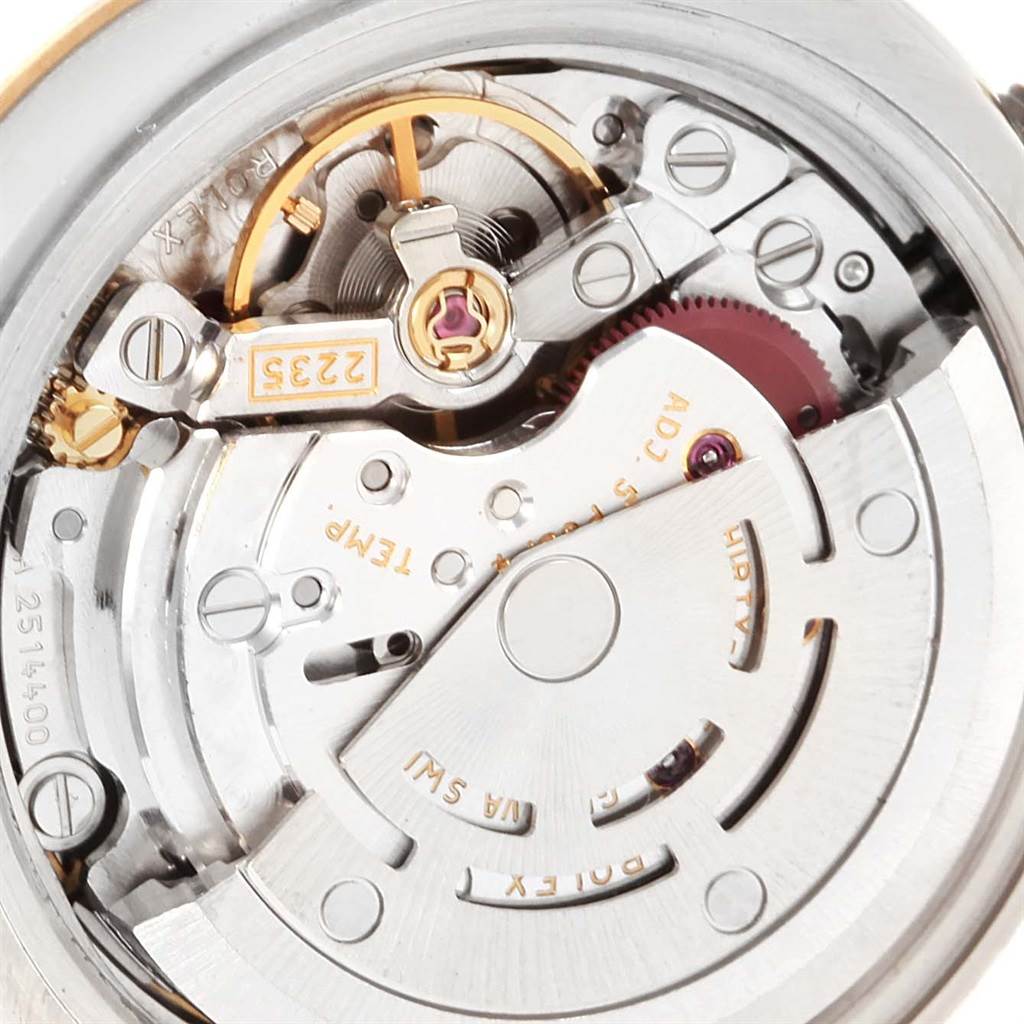 This image displays a close-up view of the movement inside a Rolex Datejust 179173 Women's Steel and Gold (two tone) Mother of Pearl Dial 179173 Women's Steel and Gold (two tone) Mother of Pearl Dial watch.