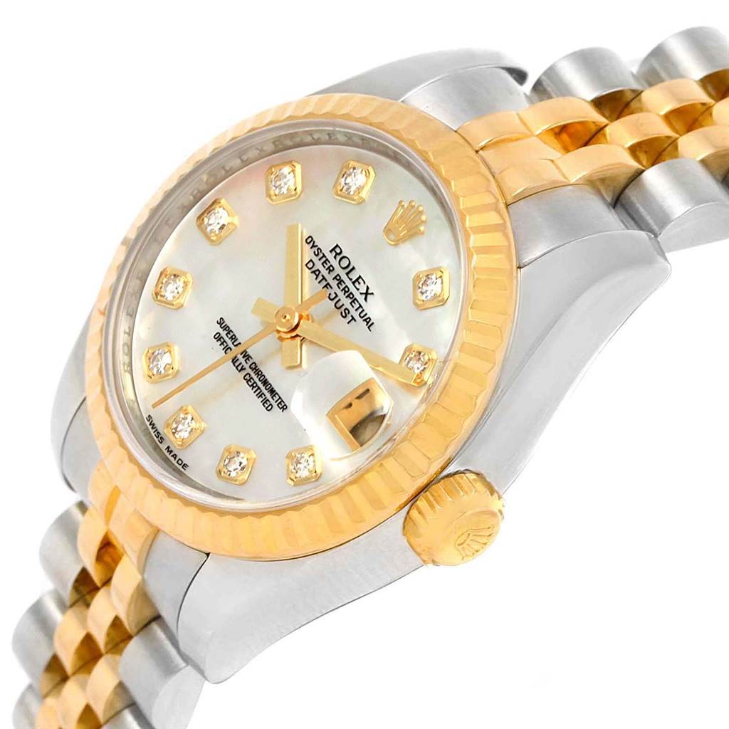This is a close-up view of a Rolex Datejust 179173 Women's Steel and Gold (two tone) Mother of Pearl Dial 179173 Women's Steel and Gold (two tone) Mother of Pearl Dial watch, showing the dial, bezel, crown, and part of the bracelet.