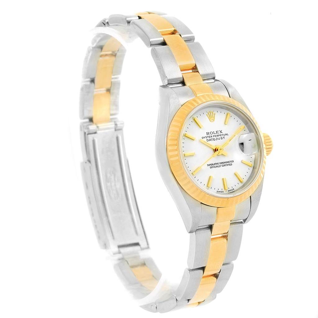 The image shows a Rolex Datejust 79173 Women's Steel and Gold (two tone) White Dial 79173 Women's Steel and Gold (two tone) White Dial watch angled to display its face and bi-color bracelet.