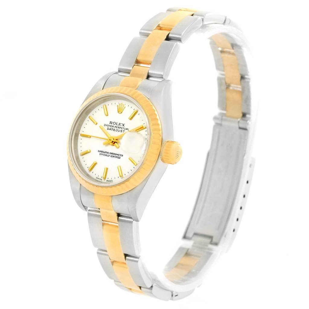 The image shows a side view of the Rolex Datejust 79173 Women's Steel and Gold (two tone) White Dial 79173 Women's Steel and Gold (two tone) White Dial watch, displaying its gold and silver bracelet and watch face.
