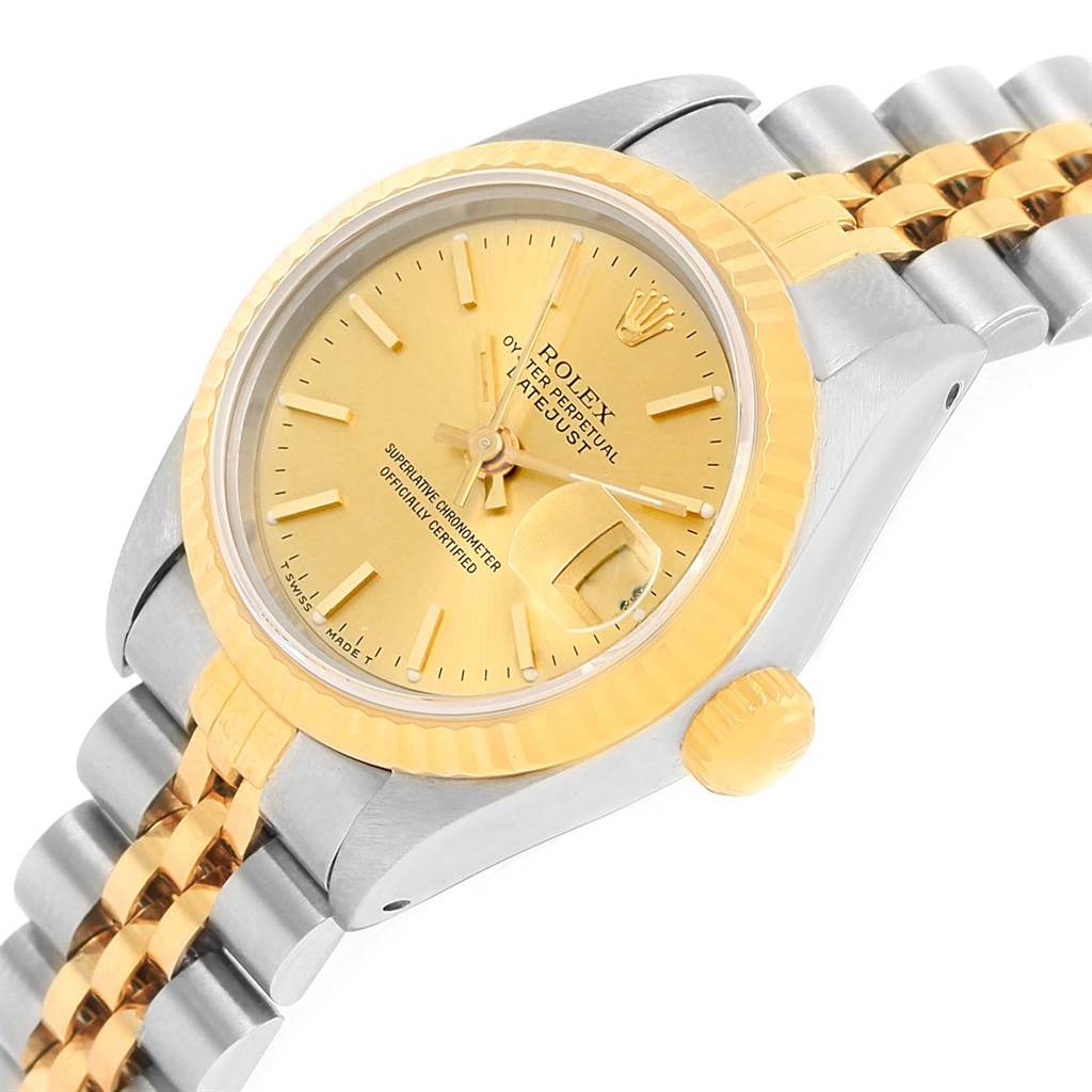 This Rolex Datejust 69173 Women's Stainless Steel Champagne Dial 69173 Women's Stainless Steel Champagne Dial watch is shown at a slight oblique angle, highlighting the gold dial, fluted bezel, crown, and Jubilee bracelet.