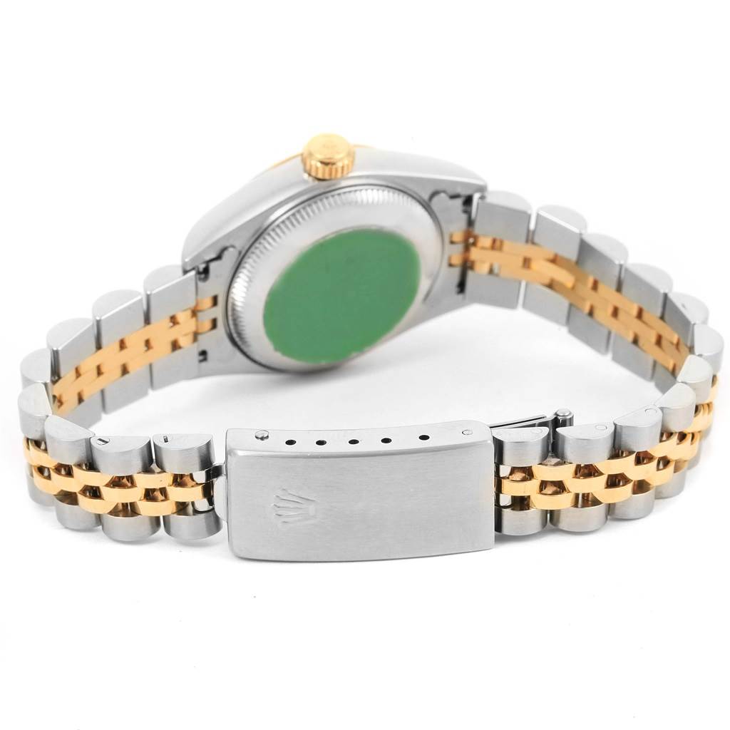 This image shows the back of a Rolex Datejust 69173 Women's Stainless Steel Champagne Dial 69173 Women's Stainless Steel Champagne Dial watch, highlighting its case, crown, and two-tone jubilee bracelet with a clasp.