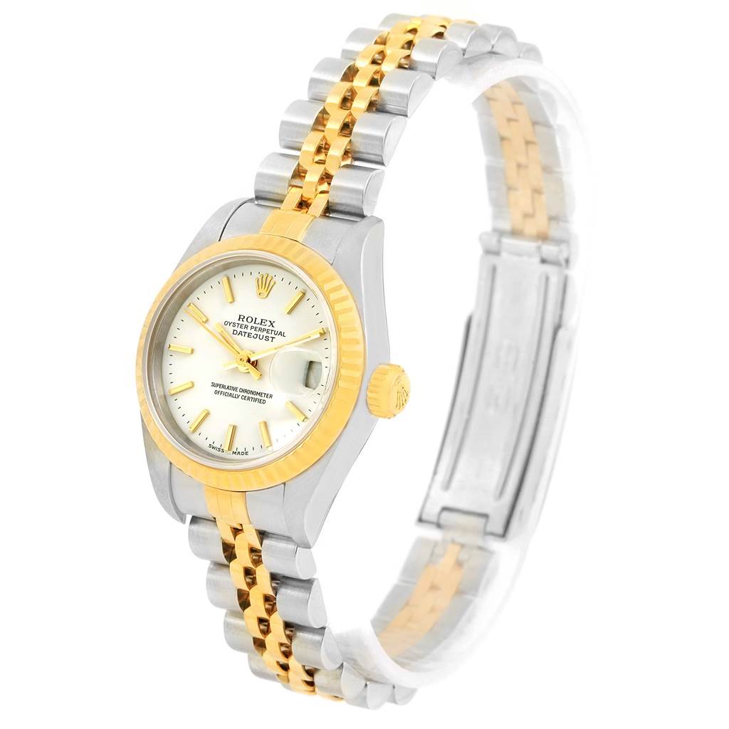 The Rolex Datejust 79173 Women's Steel and Gold (two tone) White Dial 79173 Women's Steel and Gold (two tone) White Dial watch is shown from a slight side angle, displaying the face, bezel, and Jubilee bracelet.