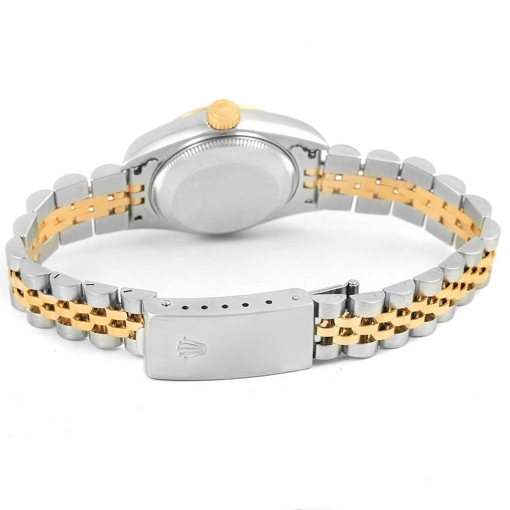 This image shows the back view of a Rolex Datejust 79173 Women's Steel and Gold (two tone) White Dial 79173 Women's Steel and Gold (two tone) White Dial, highlighting the case back, crown, and metal bracelet with a clasp.
