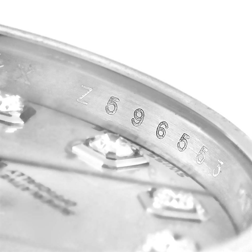 The image shows a close-up of the inner bezel with the serial number engraved on a Rolex Datejust 179174 Women's Stainless Steel Silver Dial 179174 Women's Stainless Steel Silver Dial watch.