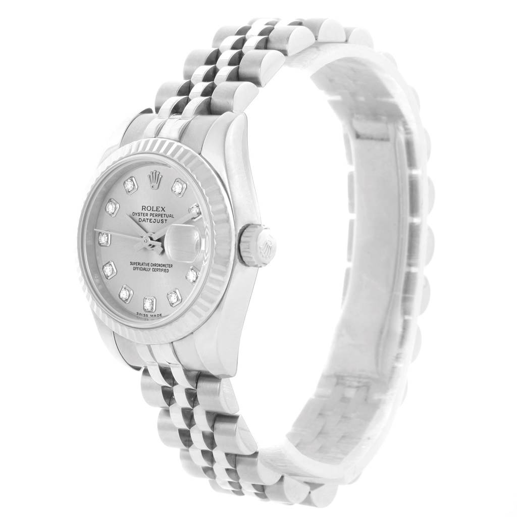 The image shows a side angle of a Rolex Datejust 179174 Women's Stainless Steel Silver Dial 179174 Women's Stainless Steel Silver Dial watch, highlighting the face, crown, and Jubilee bracelet.