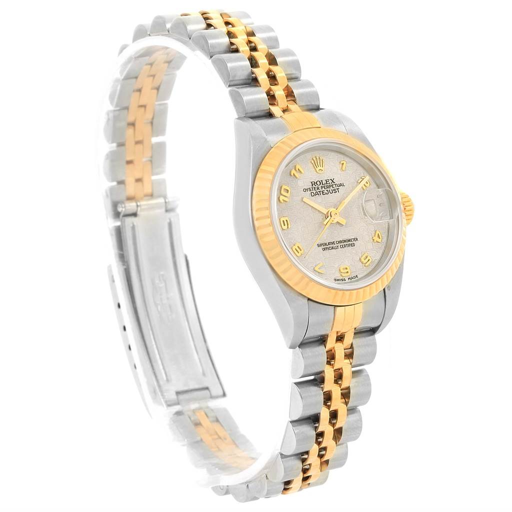 This image shows a side view of a Rolex Datejust 79173 Women's Steel and Gold (two tone) Beige Dial 79173 Women's Steel and Gold (two tone) Beige Dial watch, displaying its dial, bezel, case, and bracelet.