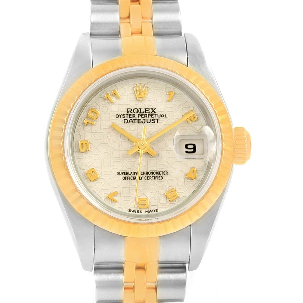 This is a front view of the Rolex Datejust 79173 Women's Steel and Gold (two tone) Beige Dial 79173 Women's Steel and Gold (two tone) Beige Dial, showing its dial, bezel, and part of the bracelet.