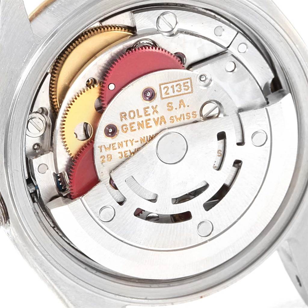 This image shows the inner mechanical movement of a Rolex Datejust 69173 Women's Stainless Steel White Dial 69173 Women's Stainless Steel White Dial watch, focusing on the intricate gears and components.