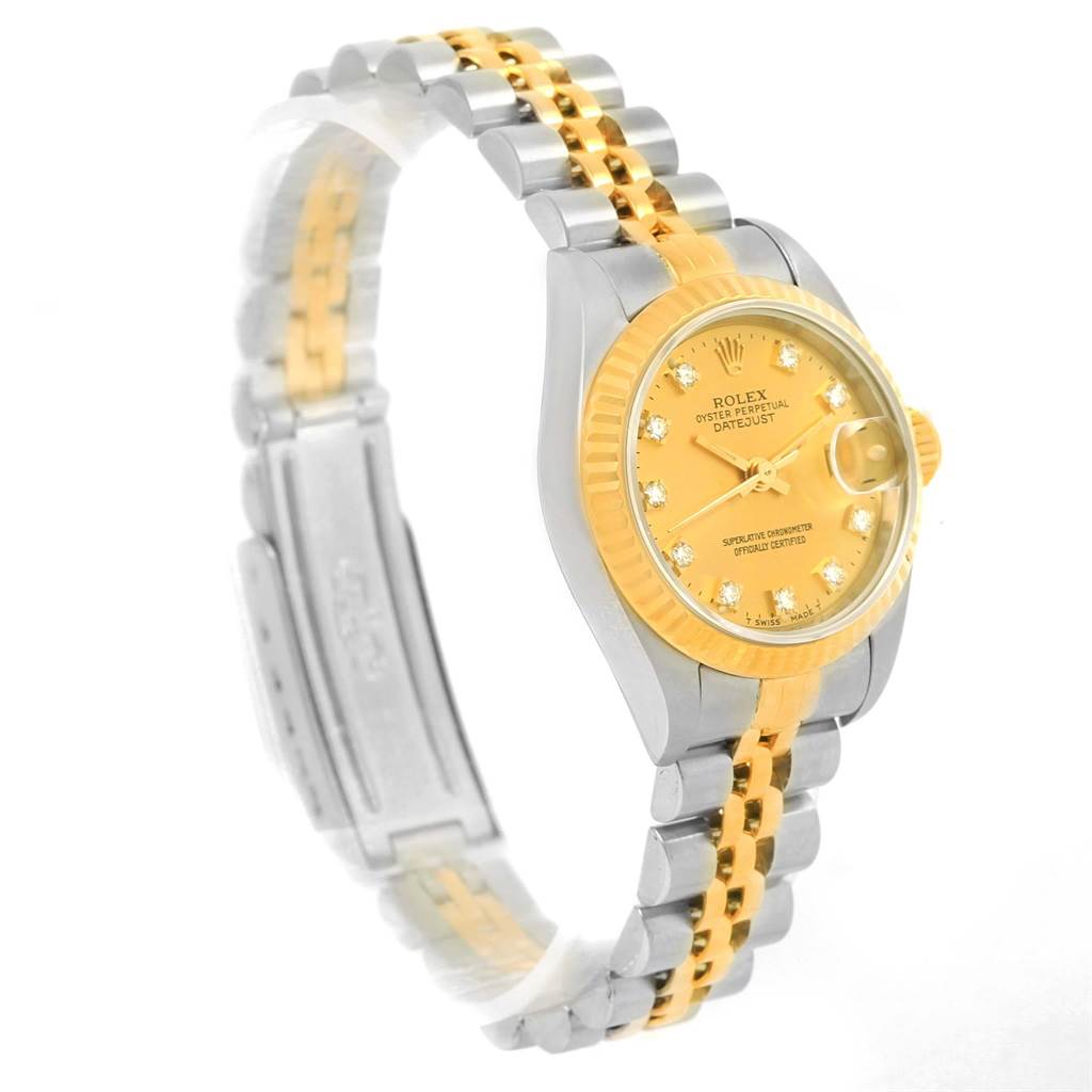 The image shows a side view of the Rolex Datejust 69173 Women's Stainless Steel Champagne Dial 69173 Women's Stainless Steel Champagne Dial watch, highlighting its two-tone bracelet and gold dial.