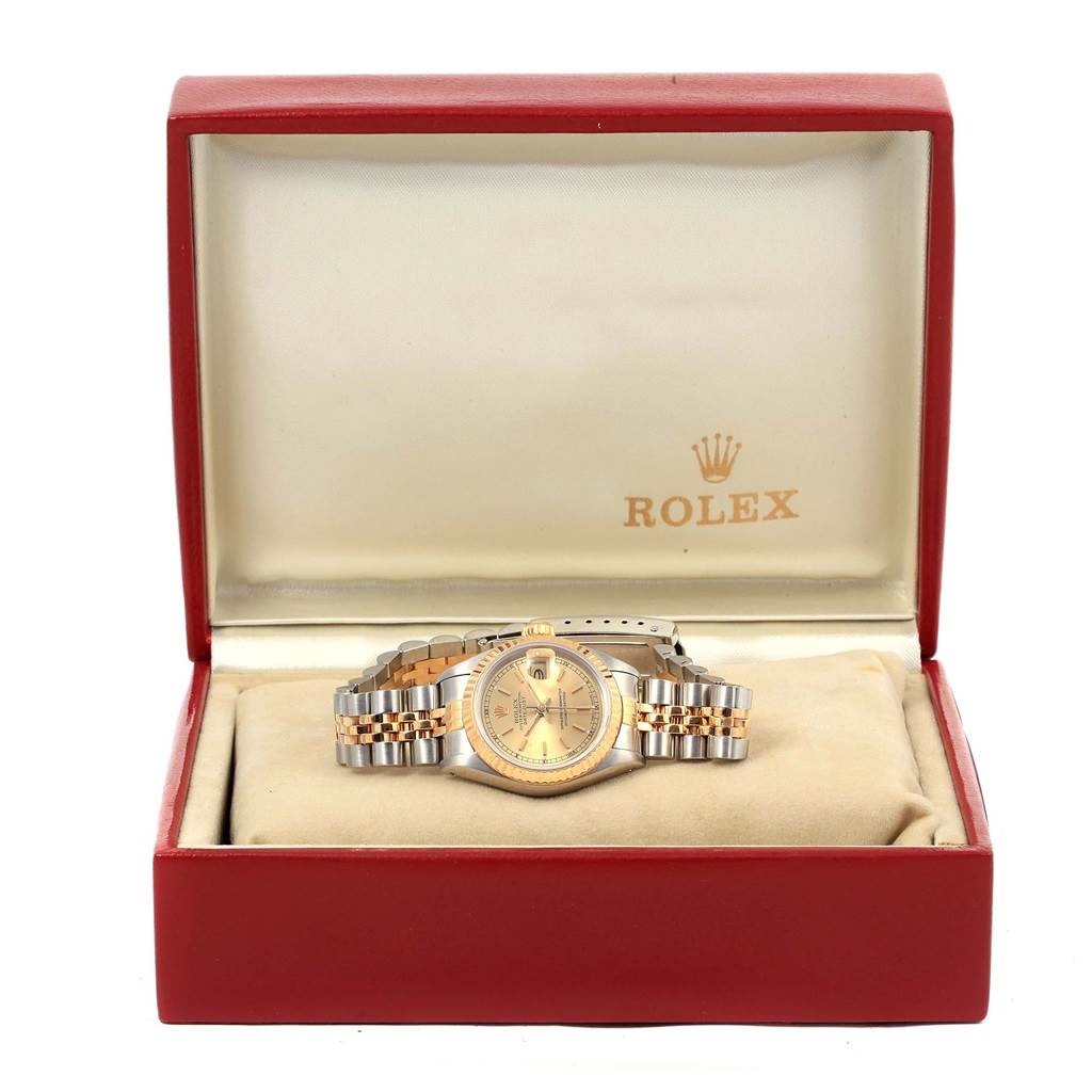 The Rolex Datejust 69173 Women's Stainless Steel Champagne Dial 69173 Women's Stainless Steel Champagne Dial watch is shown front-facing inside its branded box, highlighting its dial and bracelet.