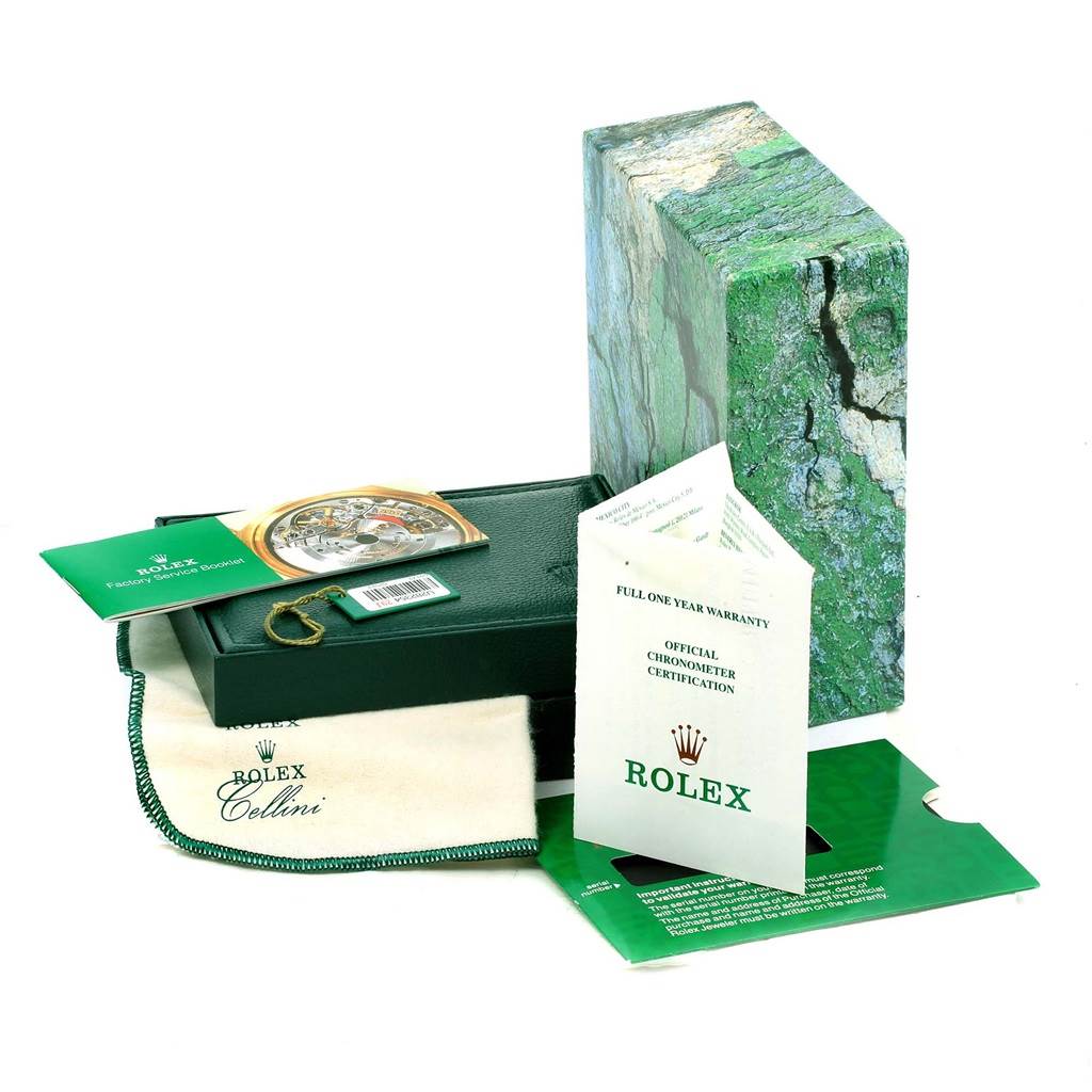 The image shows the packaging and accessories of a Rolex Datejust 69173 Women's Stainless Steel White Dial 69173 Women's Stainless Steel White Dial, including the box, warranty card, booklet, and cleaning cloth.