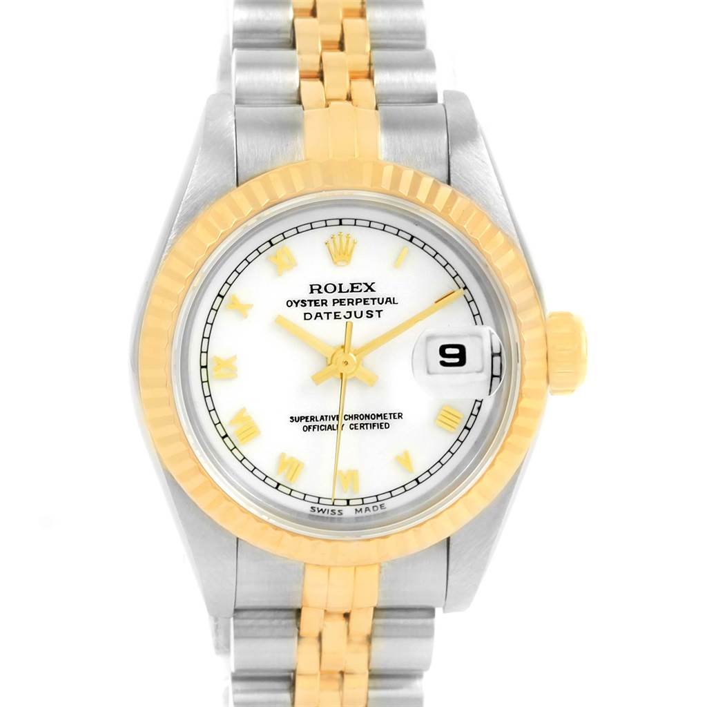 The image shows a Rolex Datejust 69173 Women's Stainless Steel White Dial 69173 Women's Stainless Steel White Dial watch from a top-down view, highlighting its dial, bezel, and part of the band.