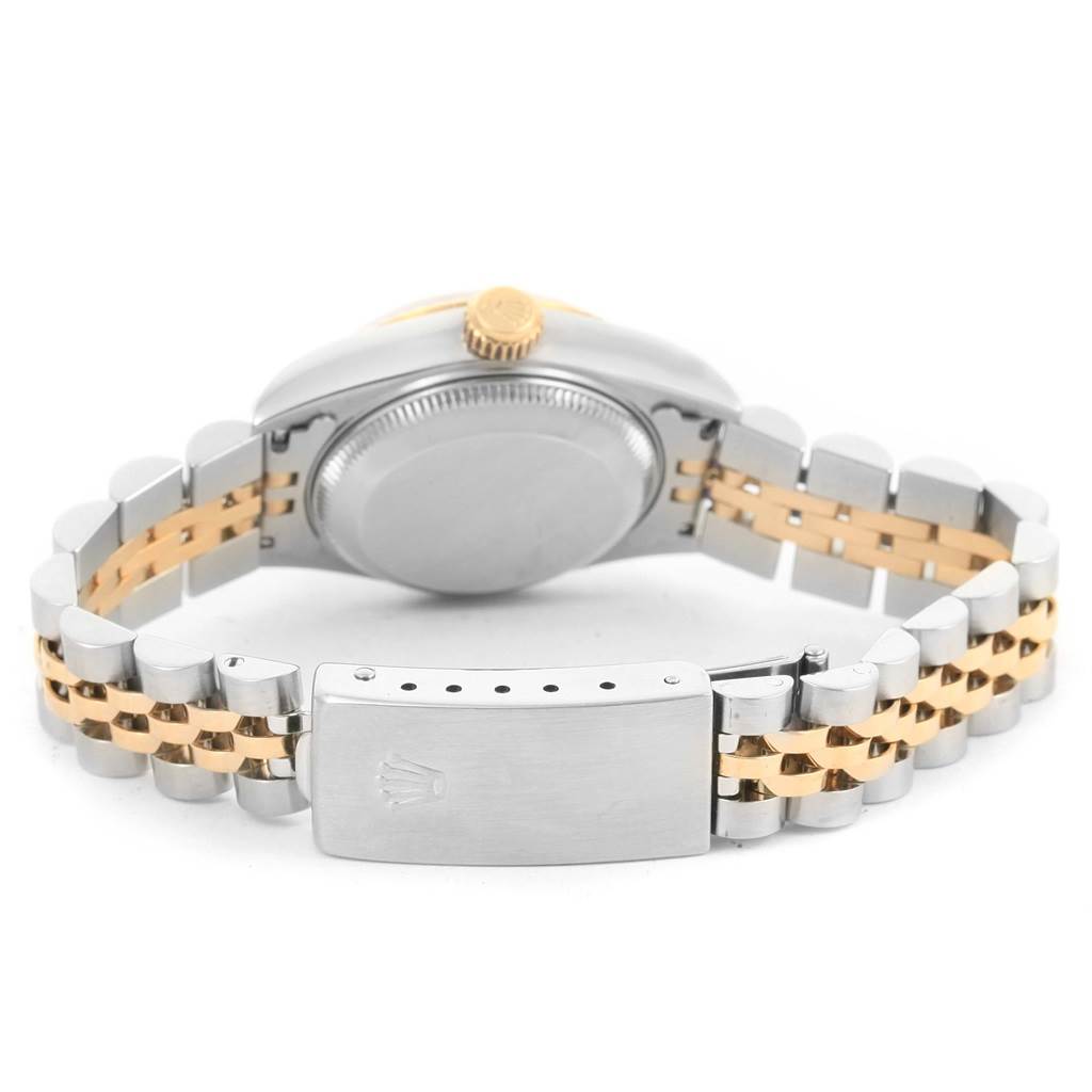 This image shows the back and bracelet of a Rolex Datejust 69173 Women's Stainless Steel White Dial 69173 Women's Stainless Steel White Dial watch at an angle, highlighting the two-tone metal design.