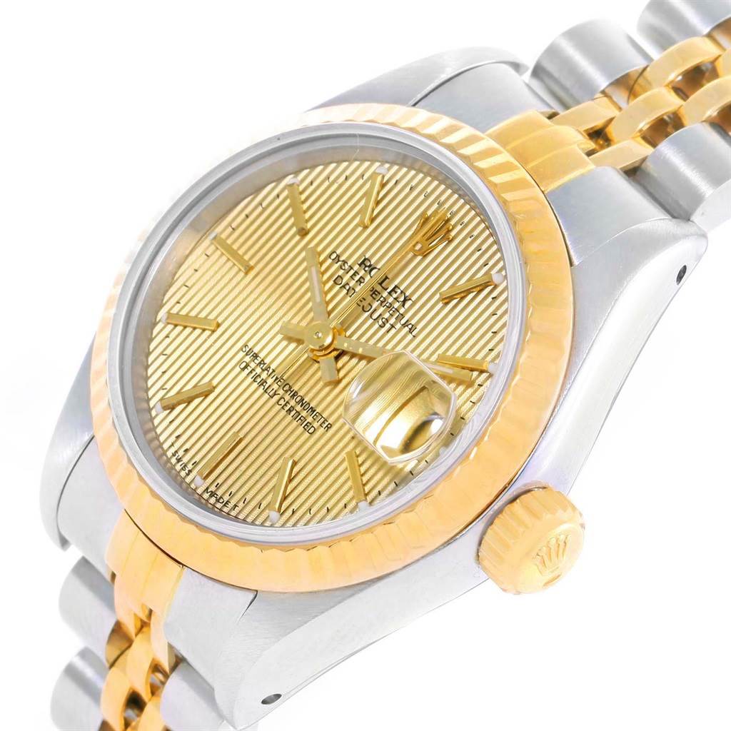 The Rolex Datejust 69173 Women's Stainless Steel Champagne Dial 69173 Women's Stainless Steel Champagne Dial model watch is shown at an angle displaying the face, bezel, crown, and part of the bracelet.