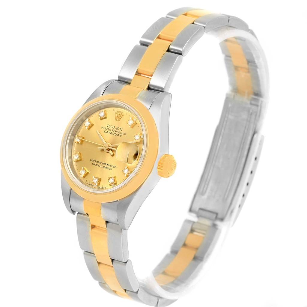 The image shows a Rolex Datejust 69163 Women's Stainless Steel Champagne Dial 69163 Women's Stainless Steel Champagne Dial watch from an angled side view, highlighting its gold and silver bracelet, face, and crown.