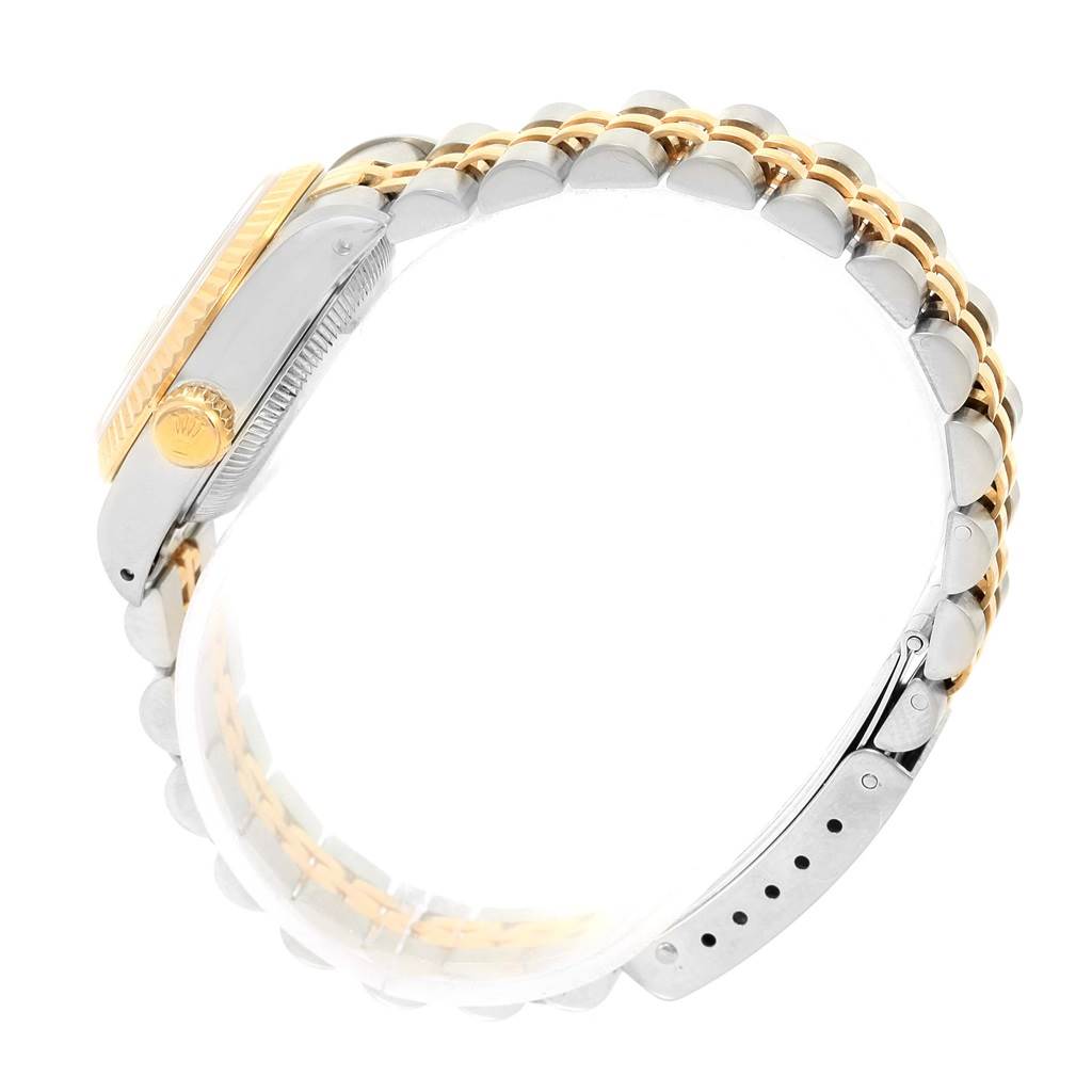 The image shows the side view and band of a Rolex Datejust 69173 Women's Stainless Steel Champagne Dial 69173 Women's Stainless Steel Champagne Dial watch, highlighting the crown, case, and two-tone bracelet.