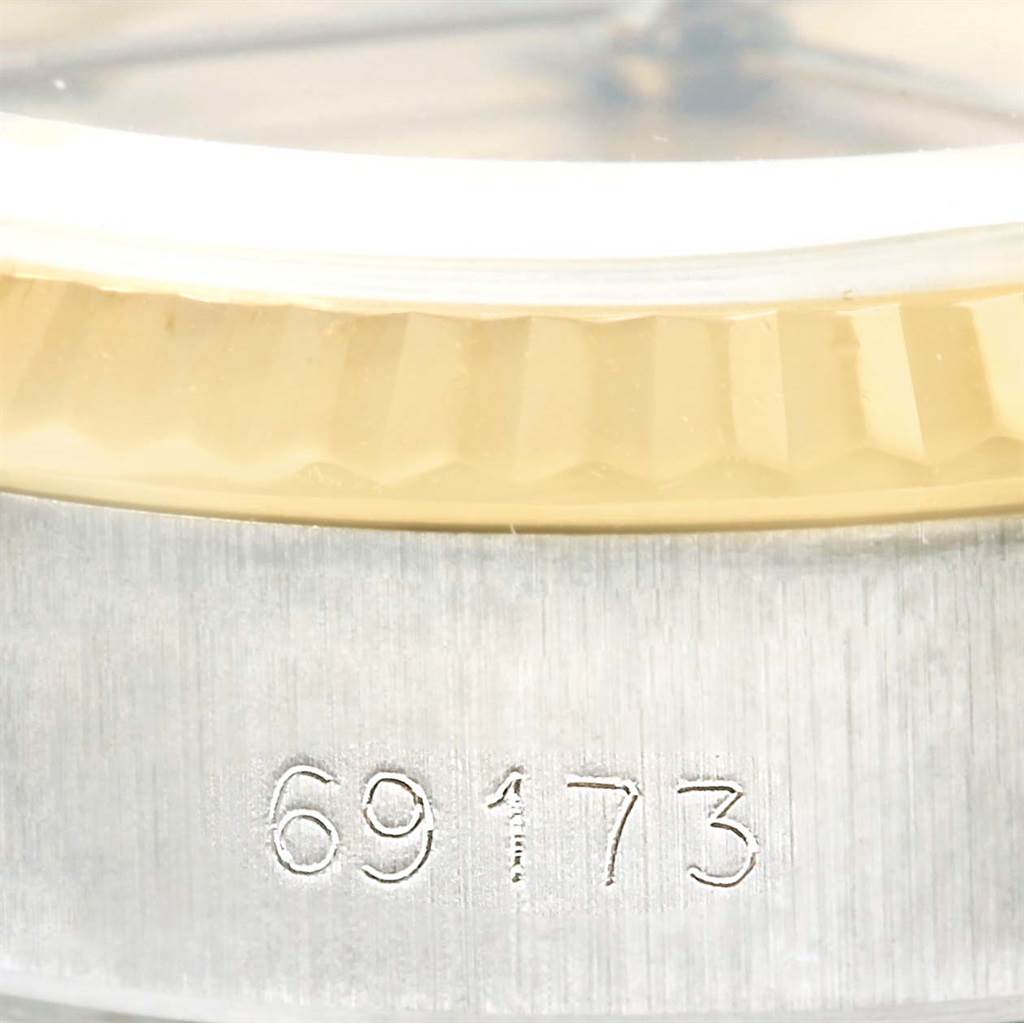 This close-up shot of a Rolex Datejust 69173 Women's Steel and Gold (two tone) Champagne Dial 69173 Women's Steel and Gold (two tone) Champagne Dial shows the bezel and case, featuring the model number "69173."