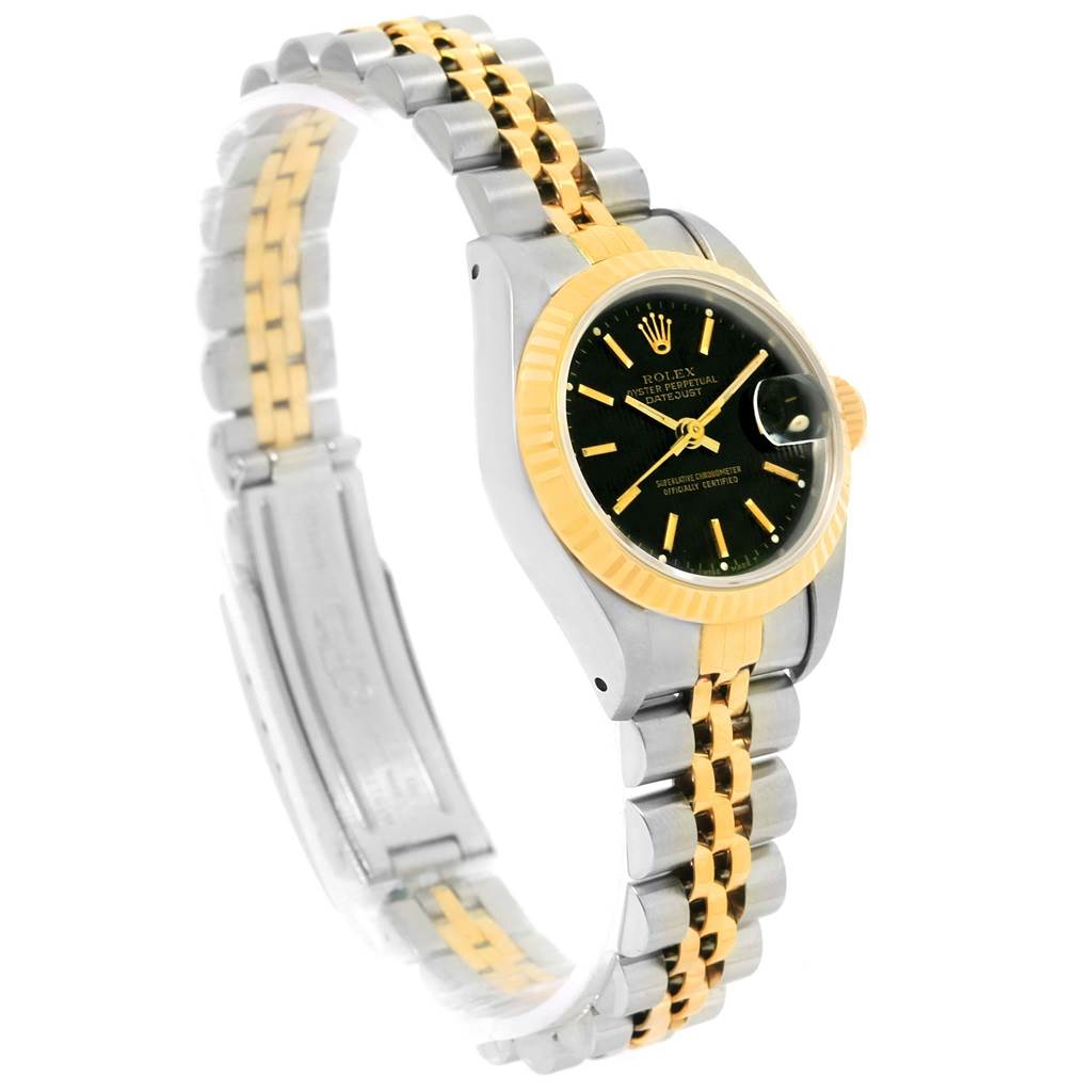The image shows a Rolex Datejust 69173 Women's Stainless Steel Black Dial 69173 Women's Stainless Steel Black Dial watch at a side angle, highlighting its two-tone bracelet and gold bezel.