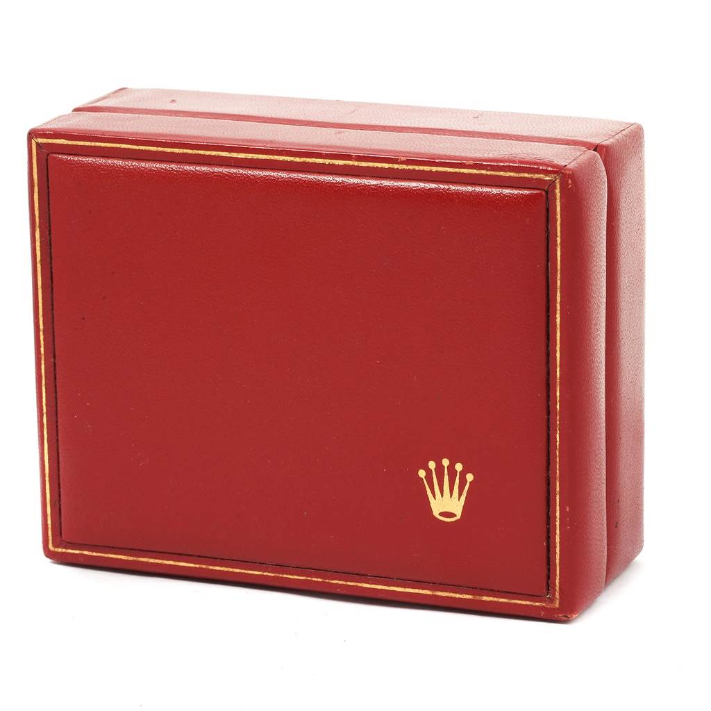 This image shows a red Rolex Datejust 69173 Women's Stainless Steel Black Dial 69173 Women's Stainless Steel Black Dial watch box, prominently displaying the brand's logo.