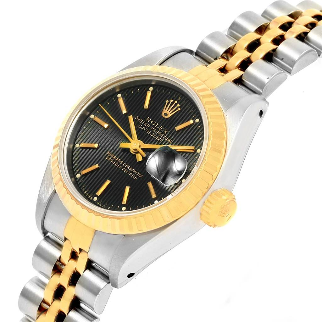 This image shows a Rolex Datejust 69173 Women's Stainless Steel Black Dial 69173 Women's Stainless Steel Black Dial watch at an angle displaying the crown, bezel, dial, and part of the bracelet.