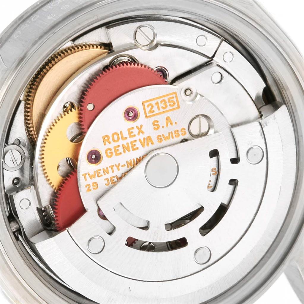 This image shows the interior movement mechanism of a Rolex Datejust 69174 Women's Stainless Steel Blue Dial 69174 Women's Stainless Steel Blue Dial watch, specifically highlighting the gears and markings.