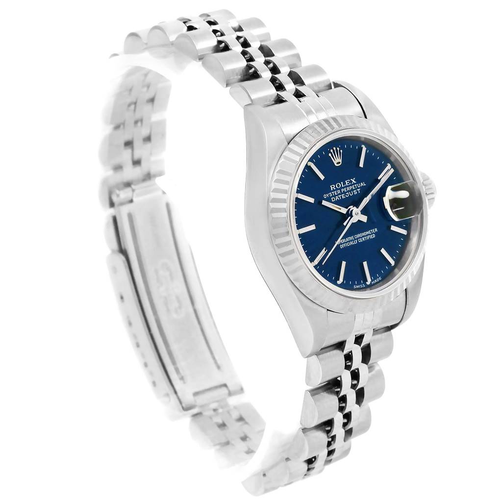 This image shows a Rolex Datejust 69174 Women's Stainless Steel Blue Dial 69174 Women's Stainless Steel Blue Dial watch from a side angle, displaying the face, bezel, and partially open bracelet.