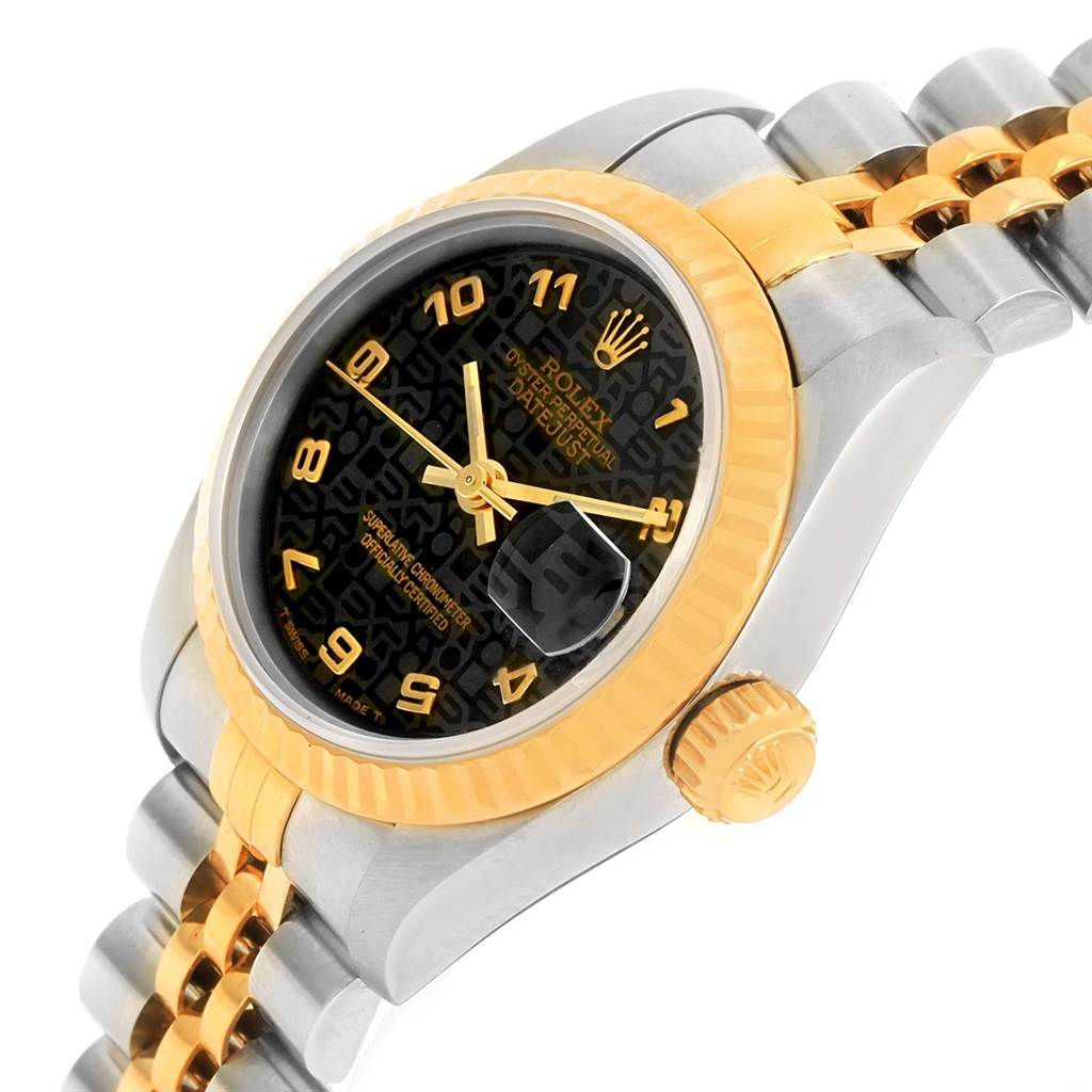 This image shows a side-angle view of a Rolex Datejust 69173 Women's Stainless Steel Black Dial 69173 Women's Stainless Steel Black Dial watch, featuring its bezel, dial, crown, and part of the bracelet.