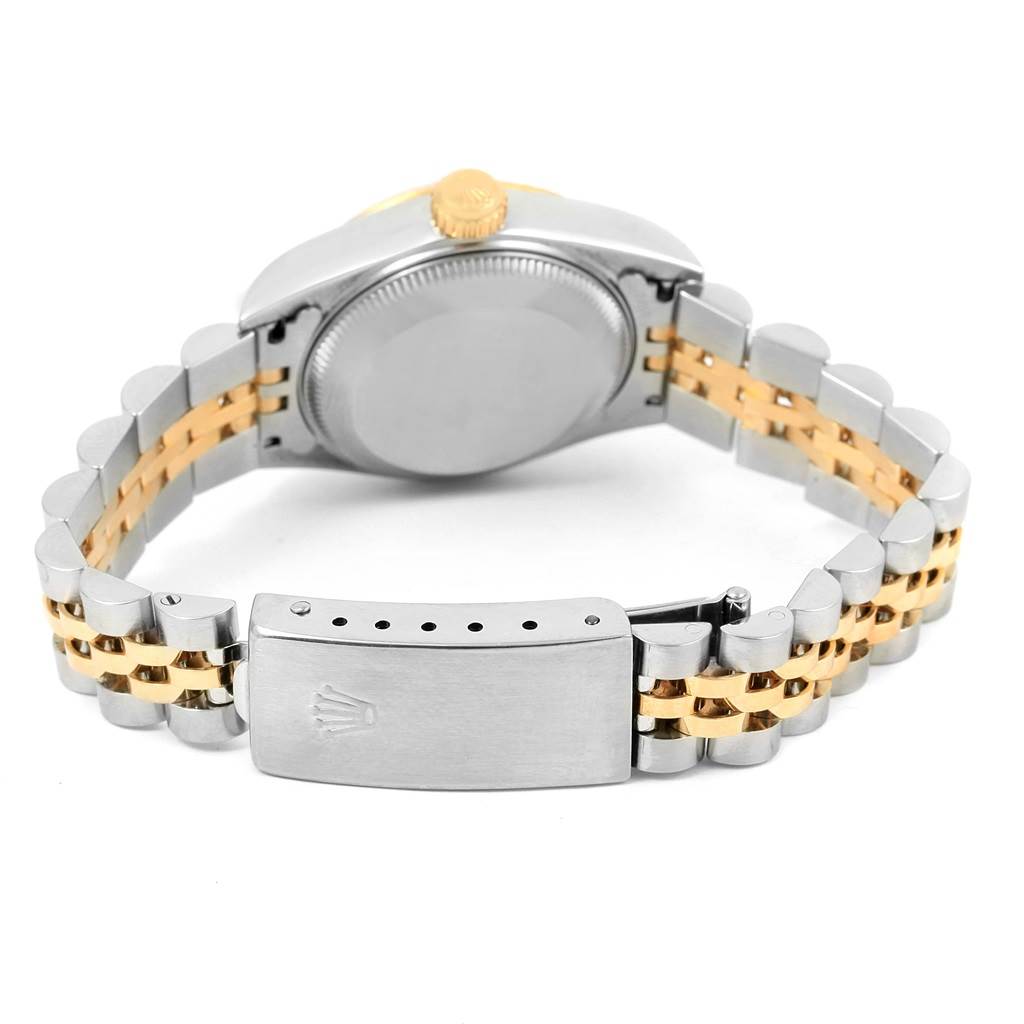 This is a rear view of the Rolex Datejust 69173 Women's Stainless Steel Grey Dial 69173 Women's Stainless Steel Grey Dial watch showcasing its closed clasp and stainless steel and gold bracelet.