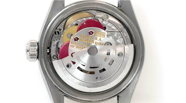 The image shows the internal mechanical movement of a Rolex Datejust 69174 Women's Stainless Steel Black Dial 69174 Women's Stainless Steel Black Dial watch viewed from the back.
