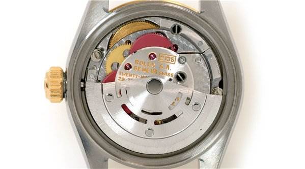 The image shows the back view of a Rolex Datejust 69173 Women's Stainless Steel Black Dial 69173 Women's Stainless Steel Black Dial watch, displaying its internal movement components.
