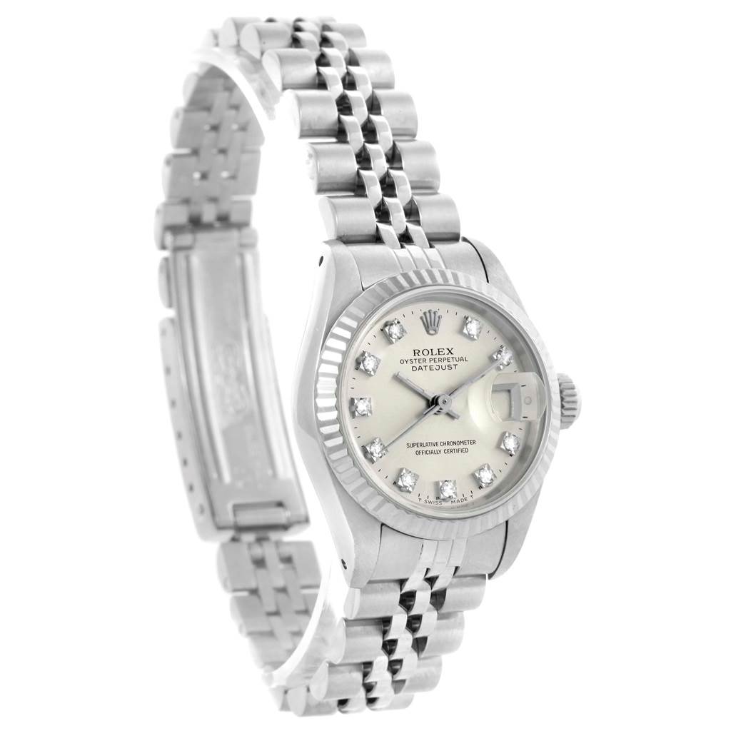 The image shows a side angle of the Rolex Datejust 69174 Women's Stainless Steel Silver Dial 69174 Women's Stainless Steel Silver Dial watch, highlighting its Jubilee bracelet, fluted bezel, and dial with diamond hour markers.