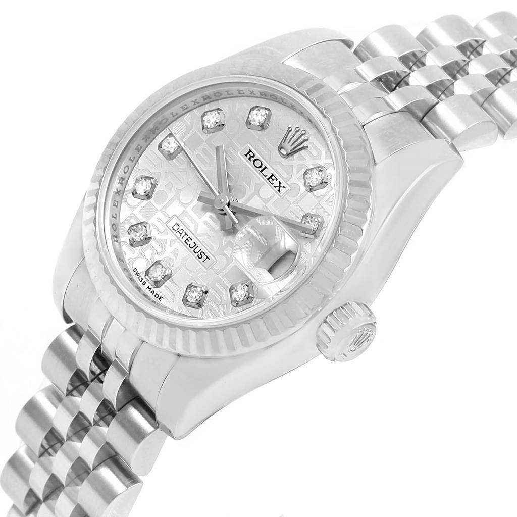 The Rolex Datejust 179174 Women's Stainless Steel Silver Dial 179174 Women's Stainless Steel Silver Dial watch is shown at a slight angle, highlighting the dial, fluted bezel, crown, and part of the bracelet.