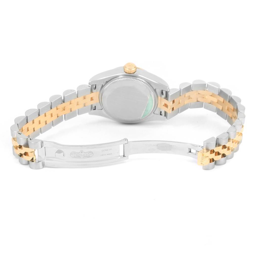 The image shows the back and clasp of a Rolex Datejust 179173 Women's Steel and Gold (two tone) Mother of Pearl Dial 179173 Women's Steel and Gold (two tone) Mother of Pearl Dial watch, highlighting its two-tone bracelet.