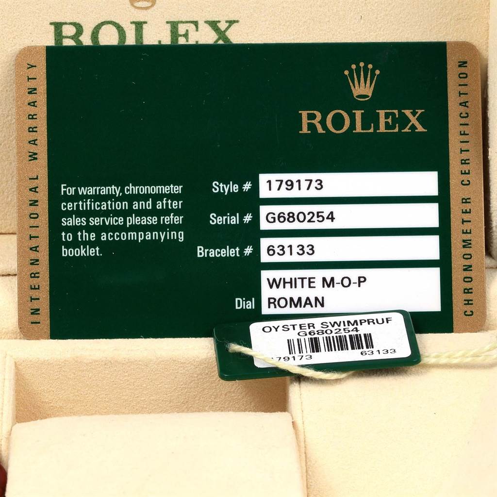The image shows the warranty card for a Rolex Datejust 179173 Women's Steel and Gold (two tone) Mother of Pearl Dial 179173 Women's Steel and Gold (two tone) Mother of Pearl Dial watch, including style, serial, and bracelet numbers.