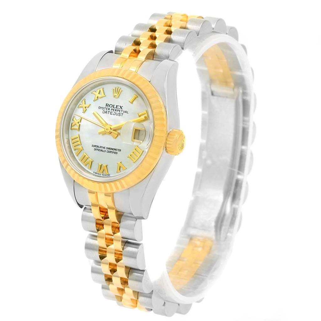 The Rolex Datejust 179173 Women's Steel and Gold (two tone) Mother of Pearl Dial 179173 Women's Steel and Gold (two tone) Mother of Pearl Dial watch is shown at an angled view, displaying the dial, bezel, and two-tone bracelet.