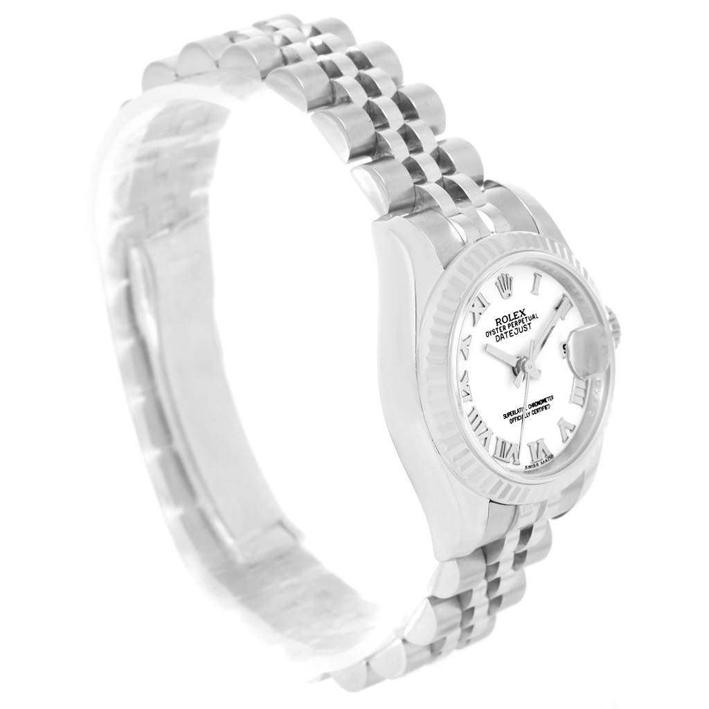 This image shows the side view of a Rolex Datejust 179174 Women's Stainless Steel White Dial 179174 Women's Stainless Steel White Dial watch, highlighting its dial, bezel, and part of the bracelet.