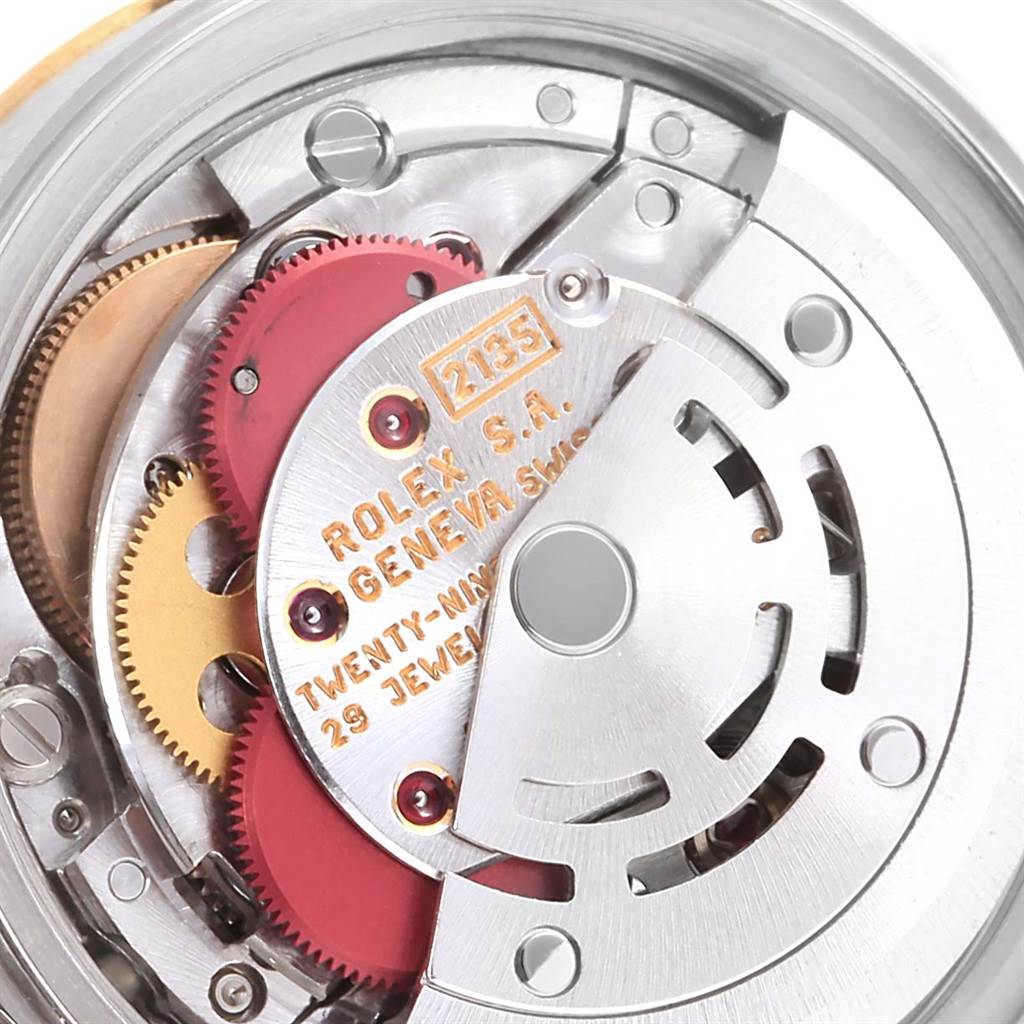 The image displays the intricate movement and internal mechanics of a Rolex Datejust 69173 Women's Stainless Steel Champagne Dial 69173 Women's Stainless Steel Champagne Dial watch.