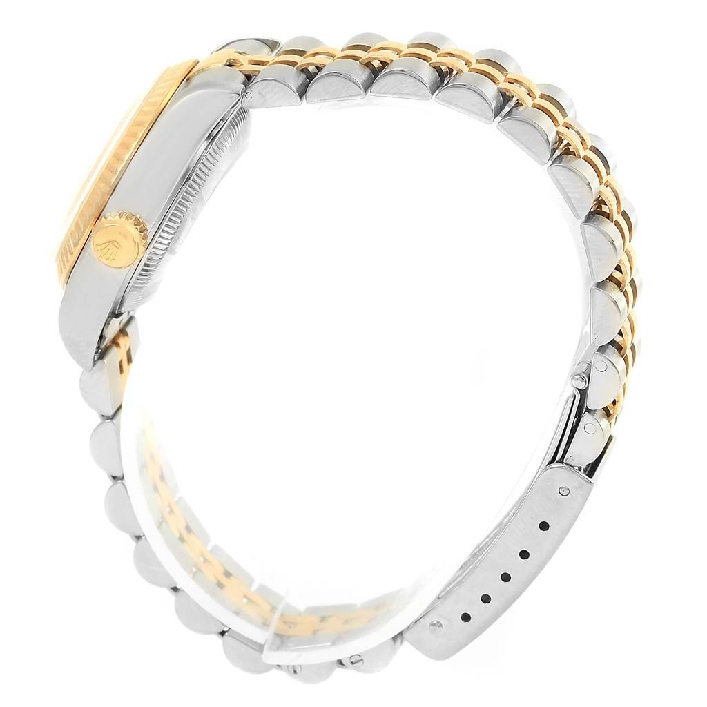 The image shows a side view of a Rolex Datejust 69173 Women's Stainless Steel Champagne Dial 69173 Women's Stainless Steel Champagne Dial watch, focusing on the case, bezel, crown, and the two-tone Jubilee bracelet.