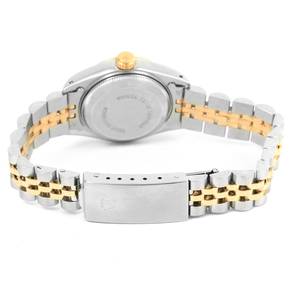 This is a rear view of a Rolex Datejust 69173 Women's Stainless Steel Grey Dial 69173 Women's Stainless Steel Grey Dial watch, showcasing its back case, crown, and two-tone bracelet.