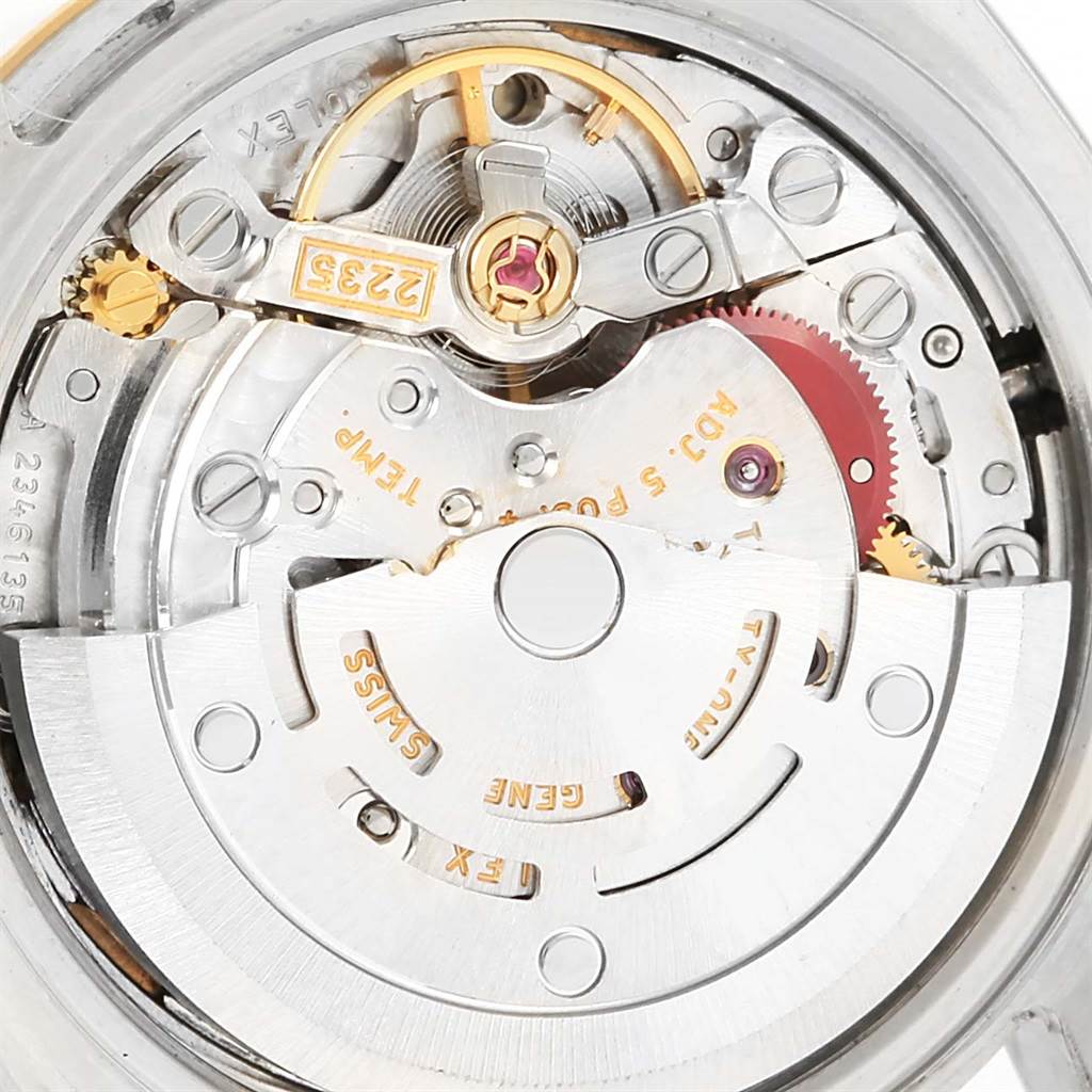 This is a close-up view of the movement mechanism of a Rolex Datejust 179173 Women's Steel and Gold (two tone) White Dial 179173 Women's Steel and Gold (two tone) White Dial watch.