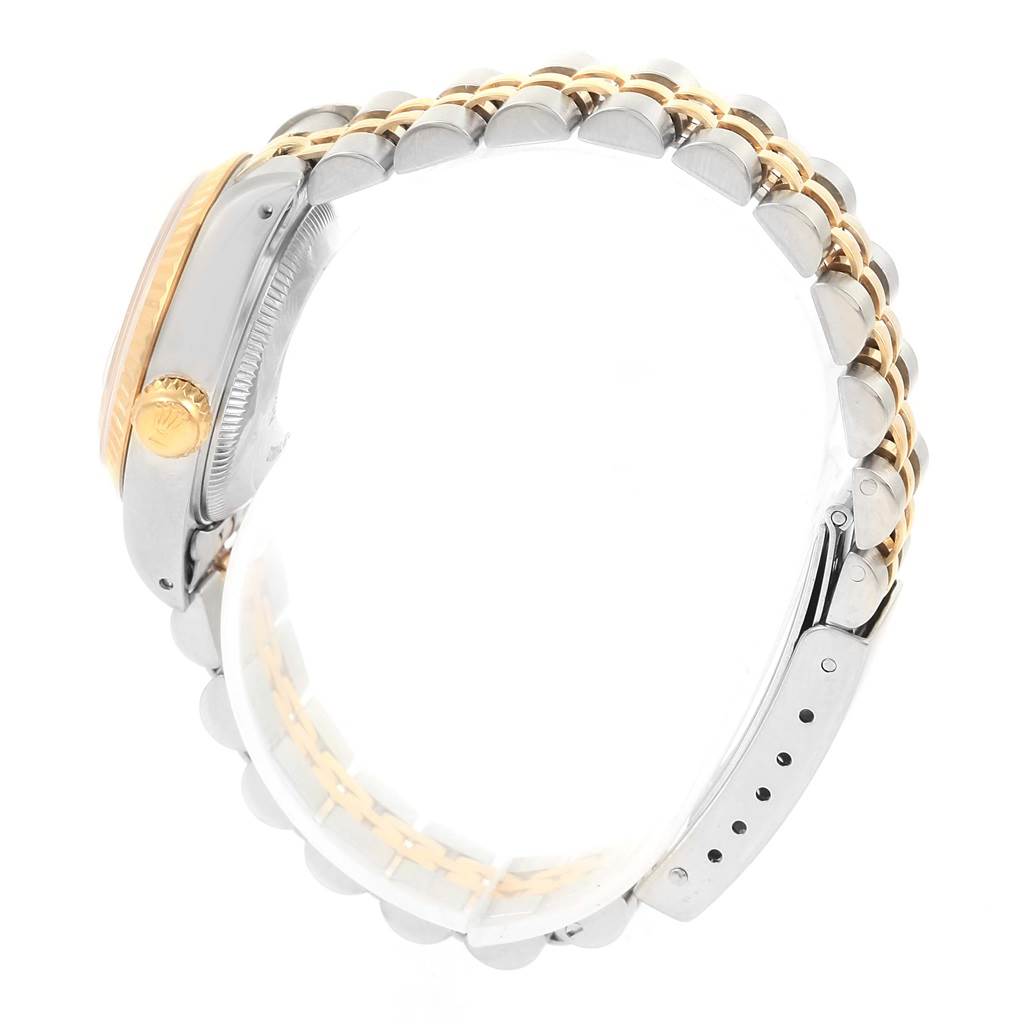 The image shows a side view of the Rolex Datejust 69173 Women's Steel and Gold (two tone) Black Dial 69173 Women's Steel and Gold (two tone) Black Dial model, highlighting the crown, case, and bracelet.