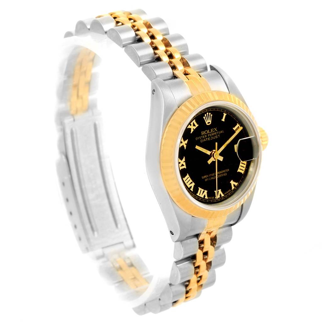 The image shows a Rolex Datejust 69173 Women's Steel and Gold (two tone) Black Dial 69173 Women's Steel and Gold (two tone) Black Dial model watch from a front angle, highlighting its black dial, gold markers, and two-tone bracelet.