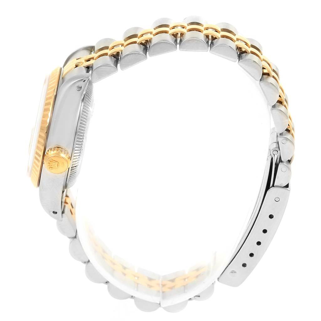 The image shows a side view of the Rolex Datejust 69173 Women's Steel and Gold (two tone) Beige Dial 69173 Women's Steel and Gold (two tone) Beige Dial watch, displaying the crown, case, and two-tone bracelet.