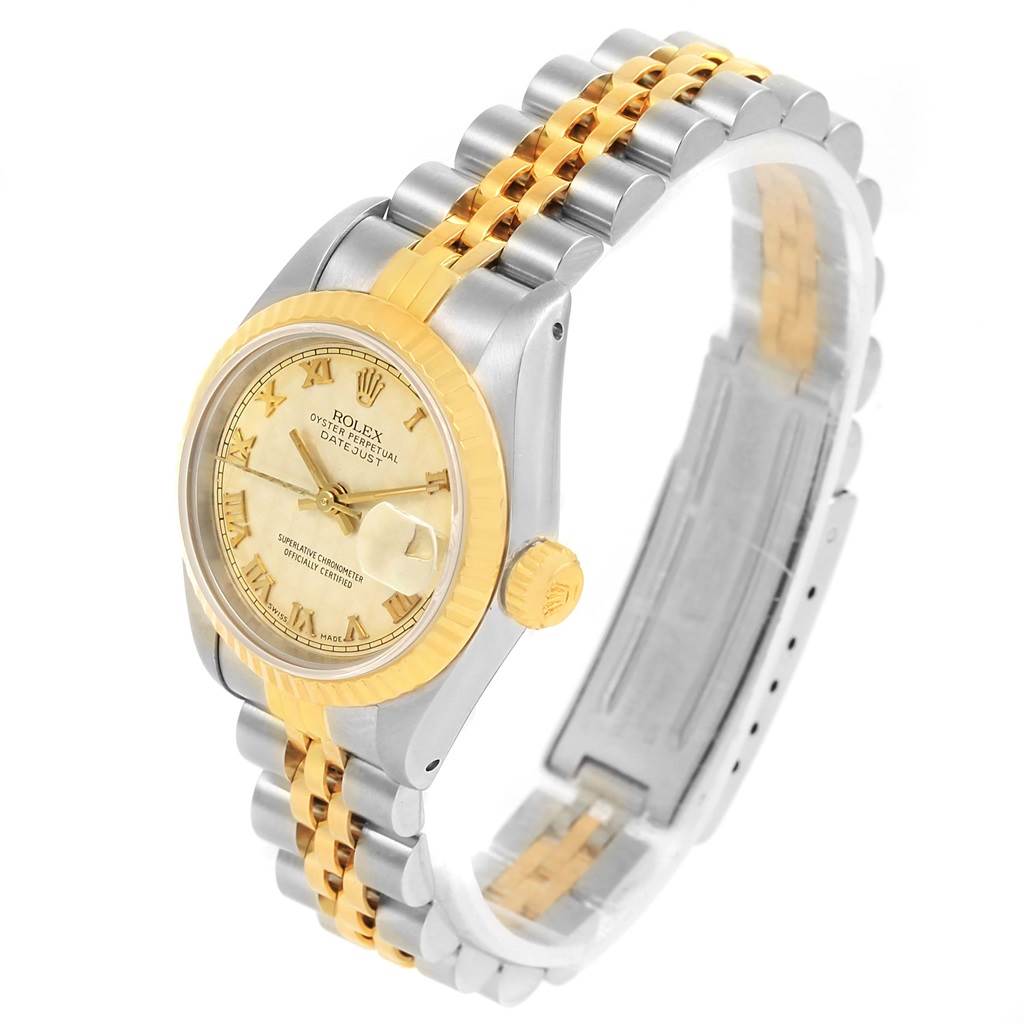 The image shows a Rolex Datejust 69173 Women's Steel and Gold (two tone) Beige Dial 69173 Women's Steel and Gold (two tone) Beige Dial model watch from a three-quarter angle, displaying the face, bezel, crown, and two-tone bracelet.