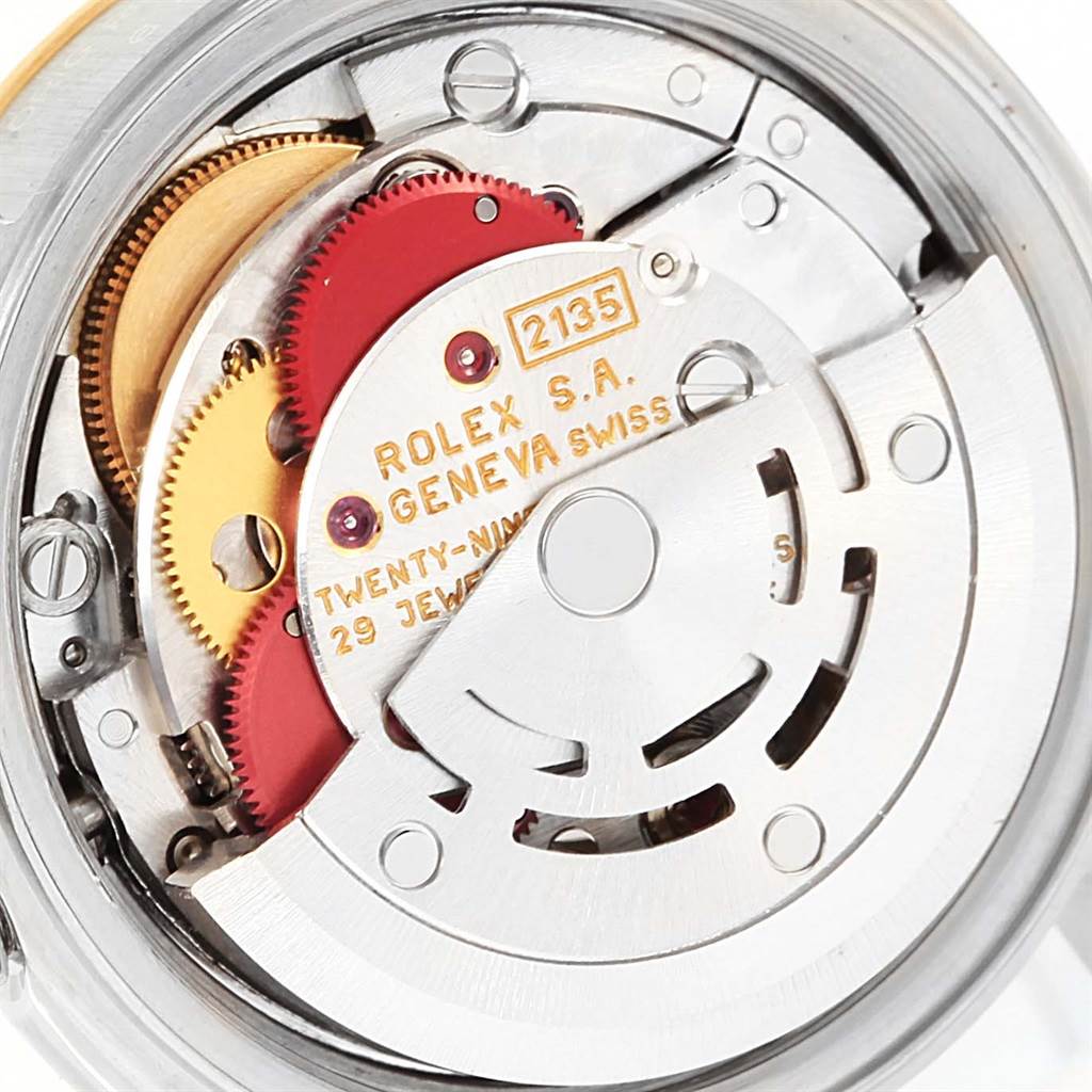 This image shows the internal movement mechanism of a Rolex Datejust 69173 Women's Stainless Steel Champagne Dial 69173 Women's Stainless Steel Champagne Dial watch, model 2135.